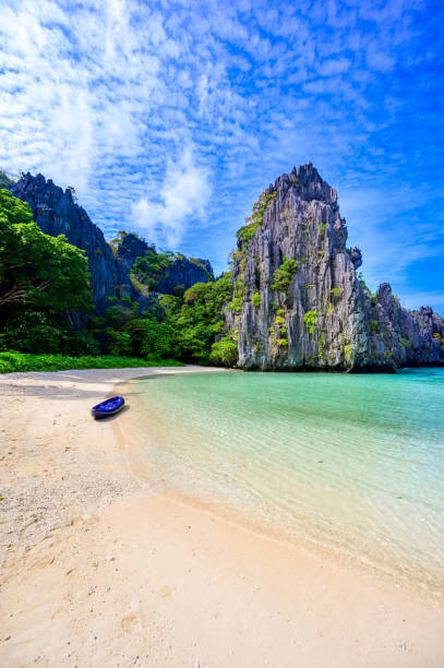 Hidden beach in Matinloc Island, El Nido, Palawan, Philippines - Tour C route - Paradise lagoon and beach in tropical scenery Hidden beach in Matinloc Island, El Nido, Palawan, Philippines -  - Paradise lagoon and beach in tropical scenery philippines landscape stock pictures, royalty-free photos & images