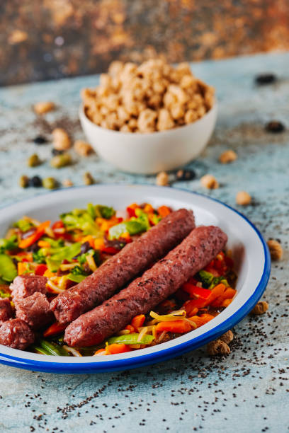istock fried veggie sausages served with grilled vegs 1387216924
