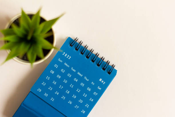 istock Desktop calendar for May 2022 for planning on a white background. 1387218533
