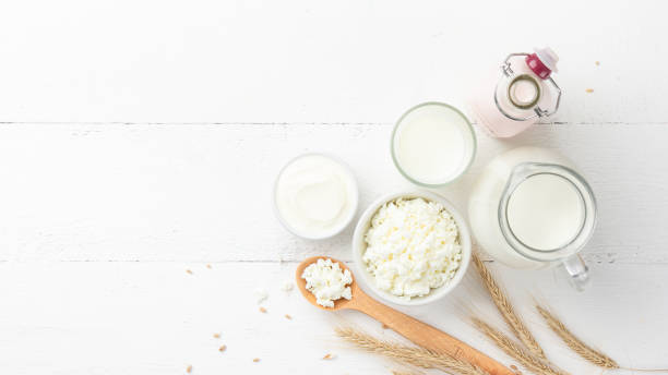 istock Organic dairy products on a white wooden background 1387219534