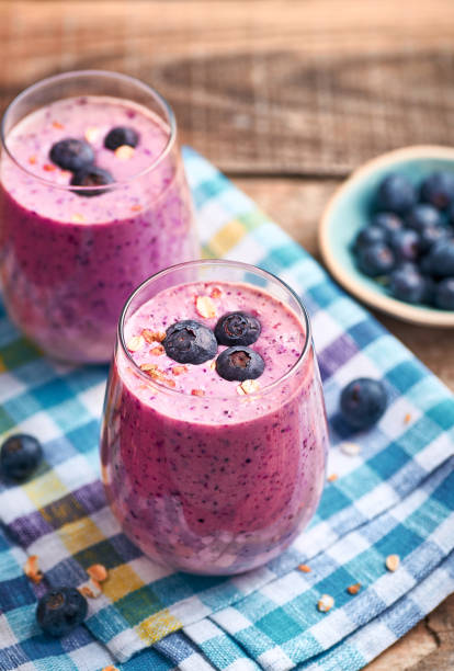 istock Blueberry smoothie in glass. 1387220786