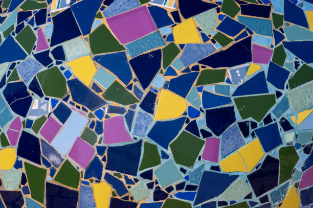 istock Wall decoration with ceramic mosaics of bright colors and unequal sizes. 1387222342