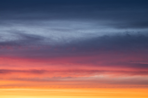 Abstract background with sunset sky in beautiful colors.
