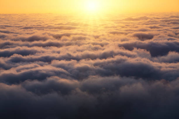 istock Sunrise Above The Clouds 1387224442