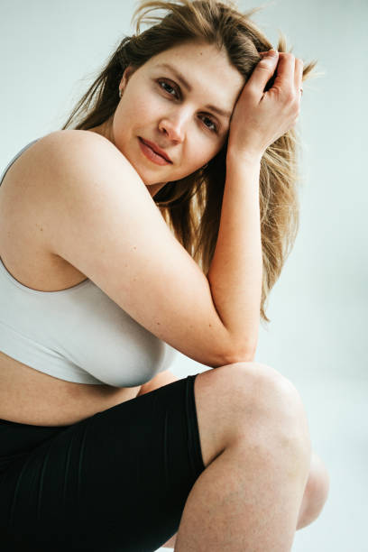 istock Portrait of handsome blond hair plus size model 1387224819