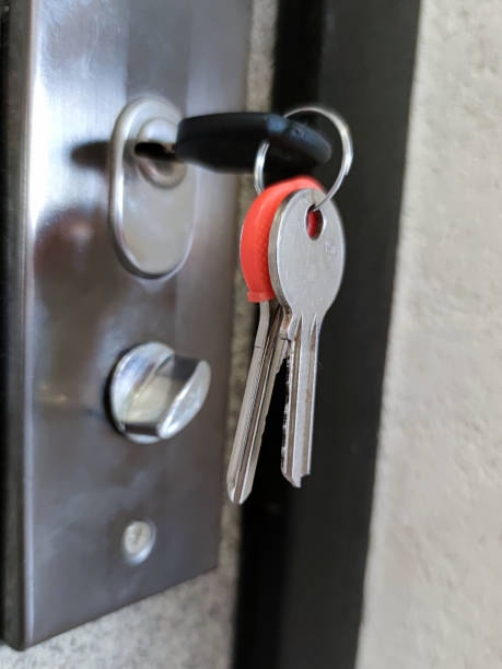 istock a bunch of keys in a door lock close-up 1387240621