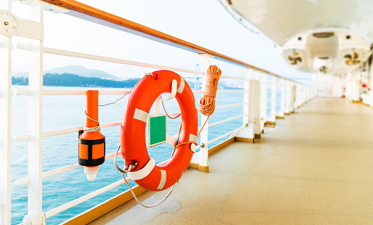Life buoy on deck of cruise ship.
