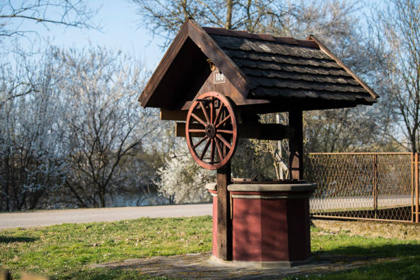 istock An old well at the farm. 1387244788