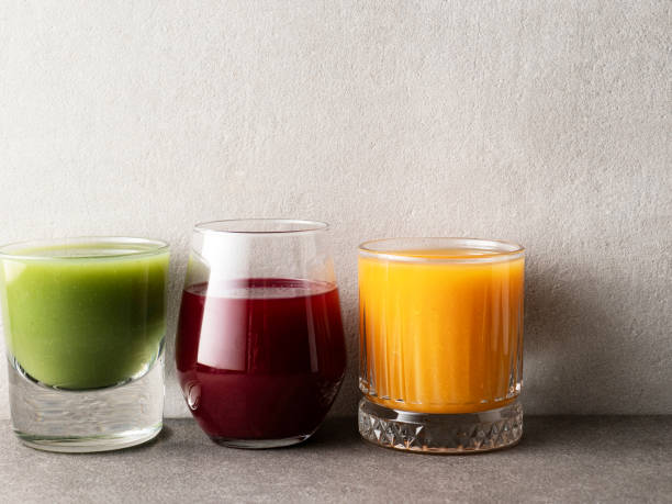 three fruits and vegetables detox drinks, fresh smoothies in glass, smoothies - blender apple banana color image imagens e fotografias de stock