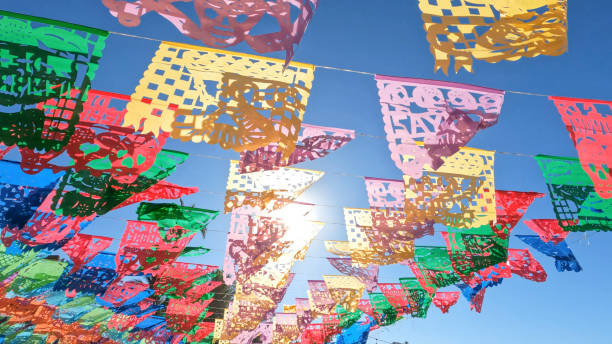 View of sunlight shining through Papel picado
