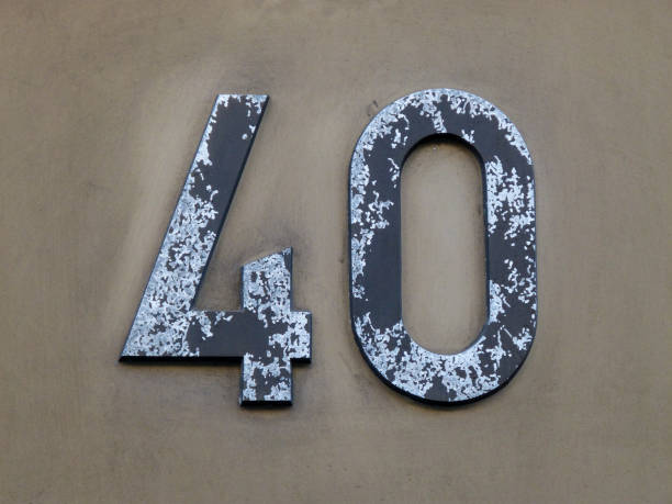 istock Metal house number on a wall 1387246322