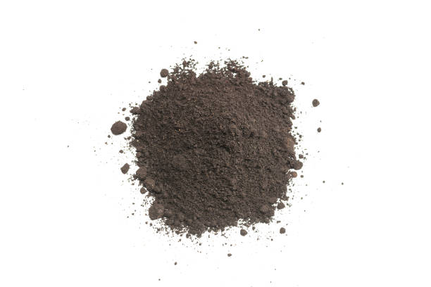 istock Black land for plant isolated on white background. 1387250002