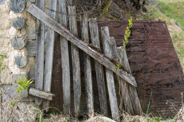 istock Old dilapidated wooden fence. 1387252142