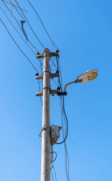 istock concrete lamppost, cables and street lamp 1387253626