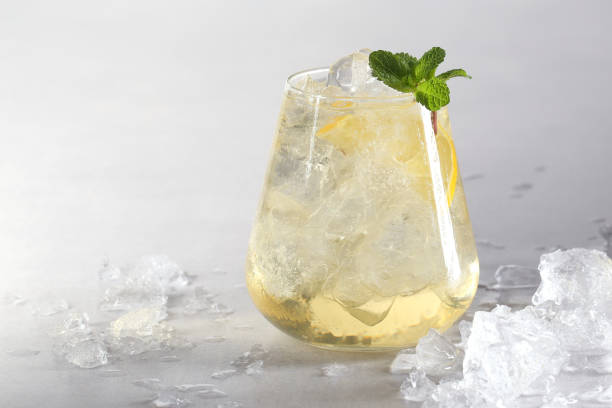 istock cold green tea with ice and mint is on the table, summer mood, cooling drink 1387256443
