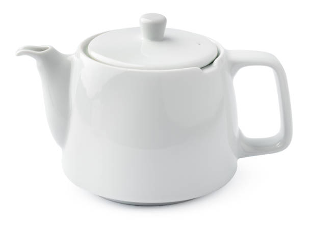 istock Tea pot isolated on white background, close up 1387258399