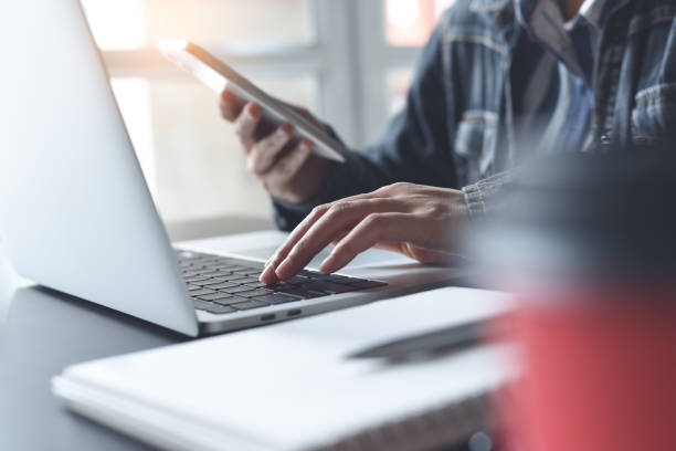 istock Woman student studying online class and searching internet, online working, E-learning concept 1387260446