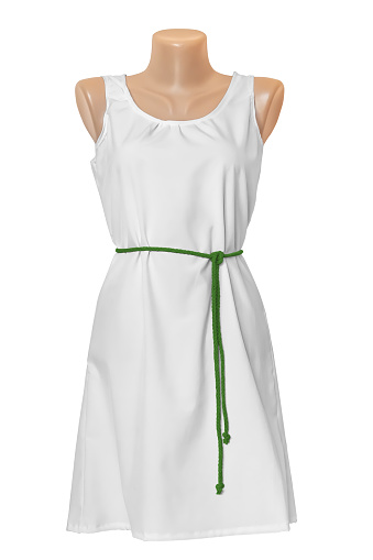 White simple female dress with a green braided belt dressed on a mannequin, isolated. Woman clothing mockup
