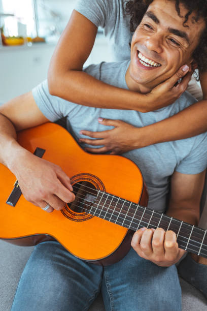 istock Man singing to his girlfriend 1387263820