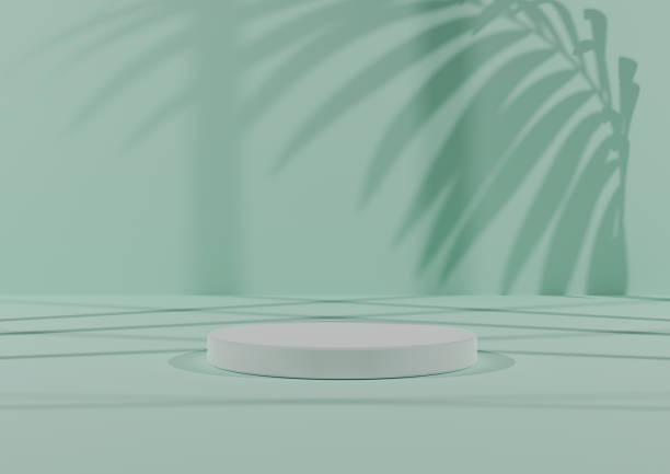 istock Three pastel pink podiums or stands on salmon pink background for product display. Minimal composition for product photography 3D rendering mockup. Window light coming from right side. 1387265010