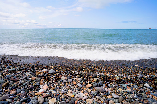 Black sea at Batumi Adjara on Spring season in March 2022 with many colours rocks beach for background