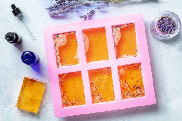 istock Organic handmade soap, overhead flat lay shot. Diy cosmetics, the process 1387267172