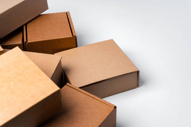 istock Lot of cardboard boxes on white background 1387268313