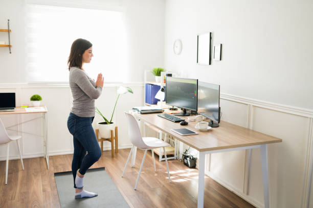 istock Fit woman working out while working from home 1387271087