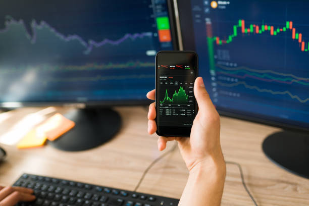 istock Gen z broker selling his stocks 1387272825