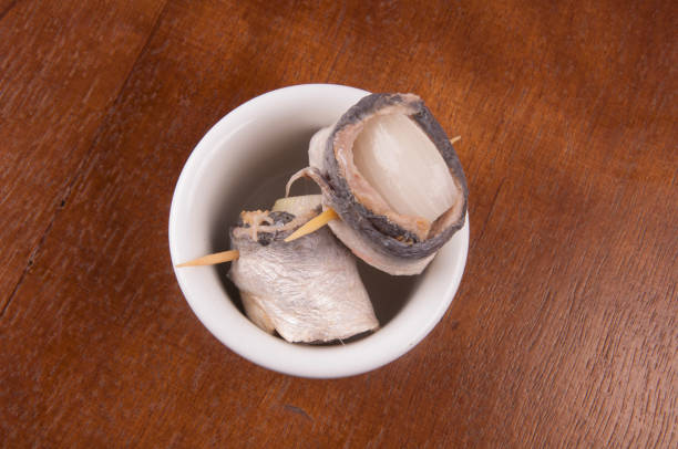 Beer Fest - rollmops - typical german delicacy with raw sardines wrapped in pickled onions