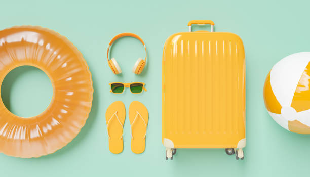 istock Flat lay orange suitcase with traveler accessories 1387273837