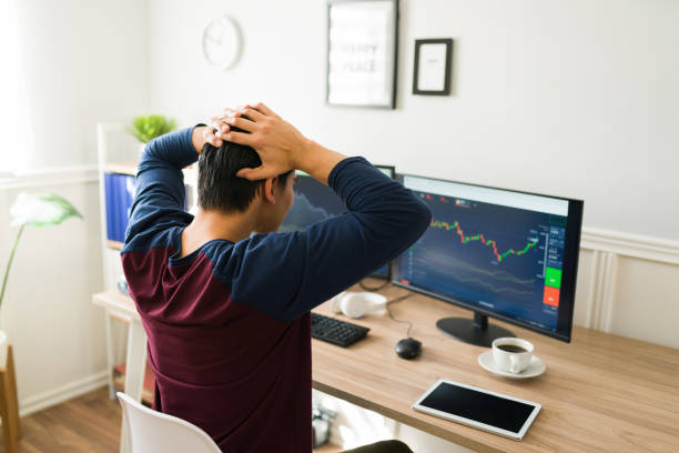 istock Stressed young man losing money 1387273864