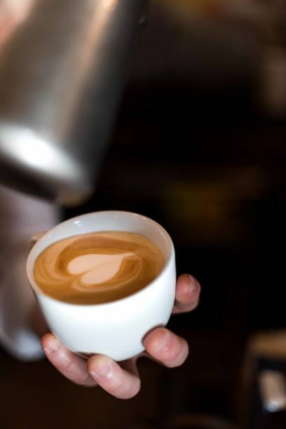 istock Hot cappuccino with heart shape. 1387273944