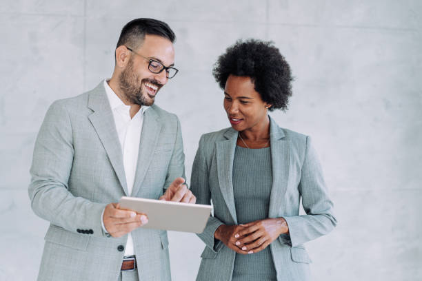 istock Business conversation in the office. 1387274046