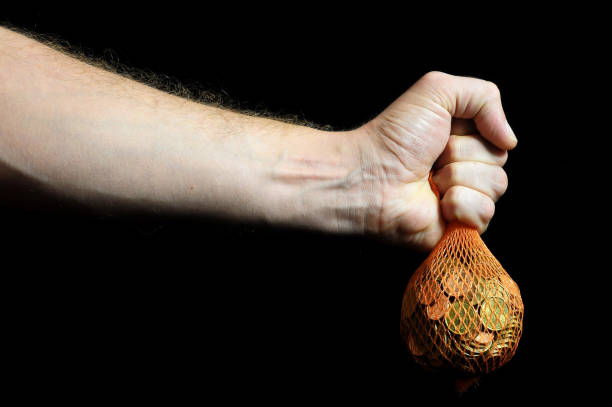 istock Trapped Money And an Hand 1387274352