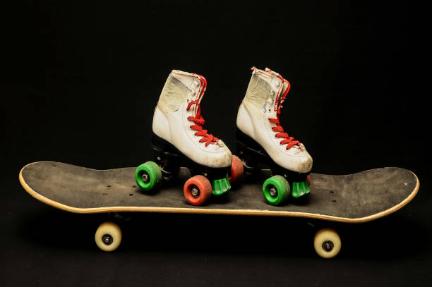 istock Old Used Wooden Skateboard 1387274413