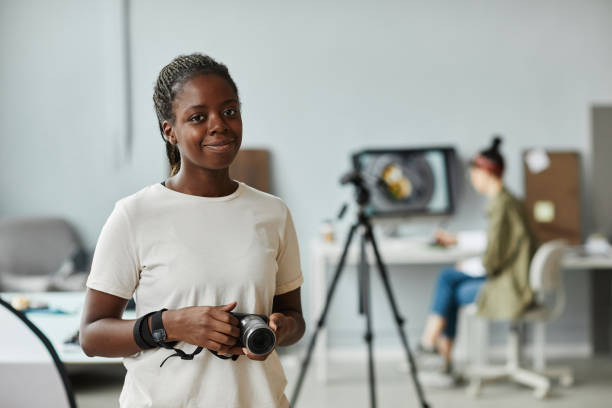 istock Black Female Photographer Portrait 1387274534