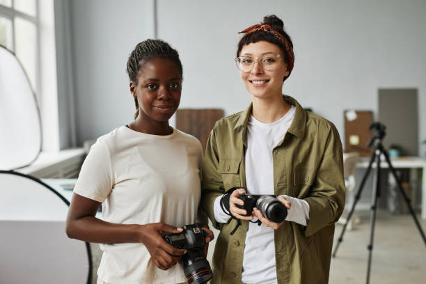 istock Two Female Photographers Portrait 1387274537