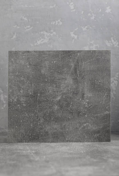 istock Abstract painted background texture at grey table top. Front view of panel plate 1387275831