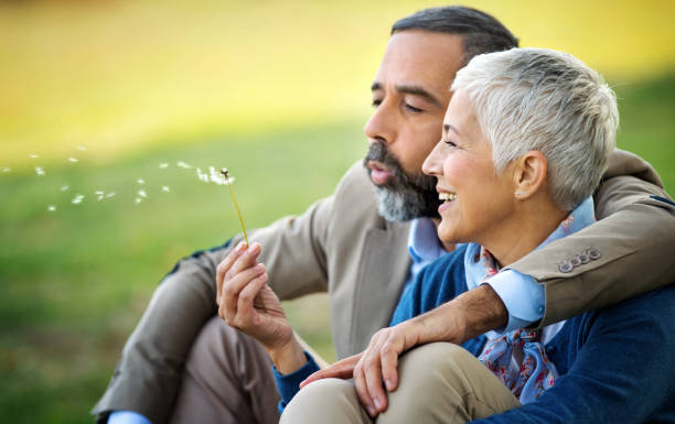 Mature couple relaxing in the park.