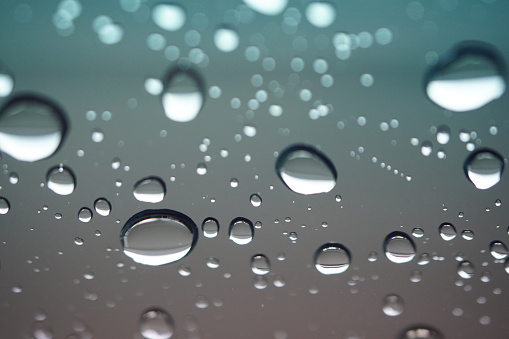 Close-up raindrops on the car window background