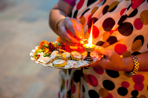The candle and plates for the ritual of Hinduism Puja, Nepal
