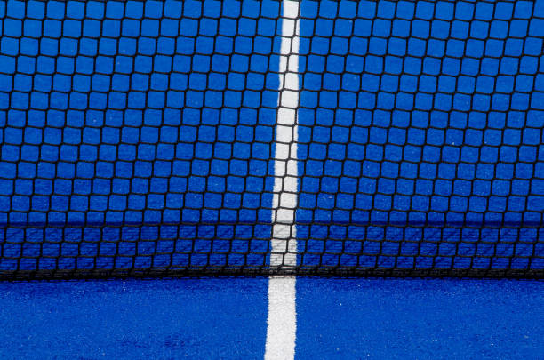 istock blue paddle tennis court net 1387288110