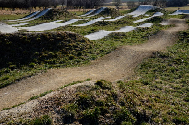 istock racing atrium bmx track for imported riders with undulating terrain tilted track with turns and jumps. wooden bridges and ramps are quite dangerous. entry only for experienced cyclists 1387291561