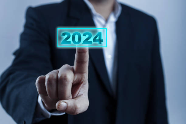 man hand touching on 2024 calender year button man hand touching on 2024 calender year button on digital virtual screen blur background 2024 30 stock pictures, royalty-free photos & images