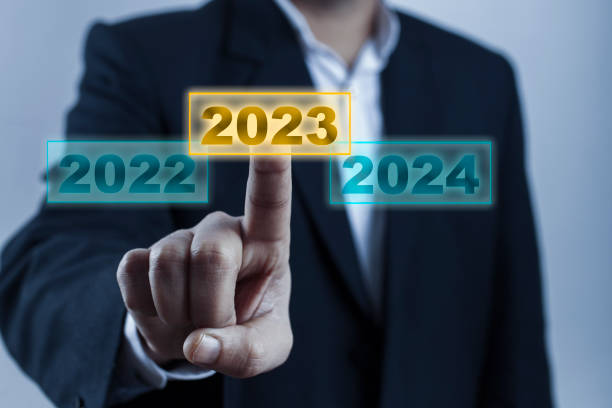 istock hand touching on 2023 calender year on digital screen 1387293886