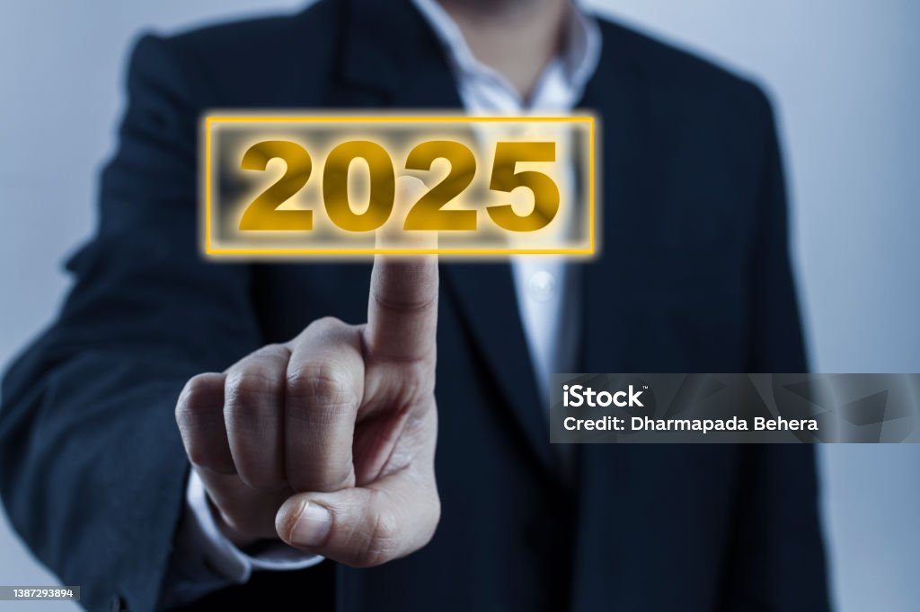 finger tip touching on 2025 year keyword cropped man wearing suit click on 2025 calender year button on digital virtual screen 2025 Stock Photo
