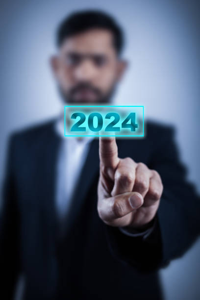 istock man hand pressing on 2024 calender year on digital screen 1387293895