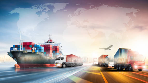Logistics import export of containers cargo freight ship, truck transport with red container on highway at port cargo shipping dock yard background, copy space, plane, transportation industry concept stock photo