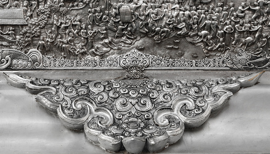 Beautiful carved patterns of silver metal in northern Thailand temples.